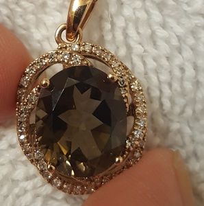 14k diamond smoky quartz pendant.